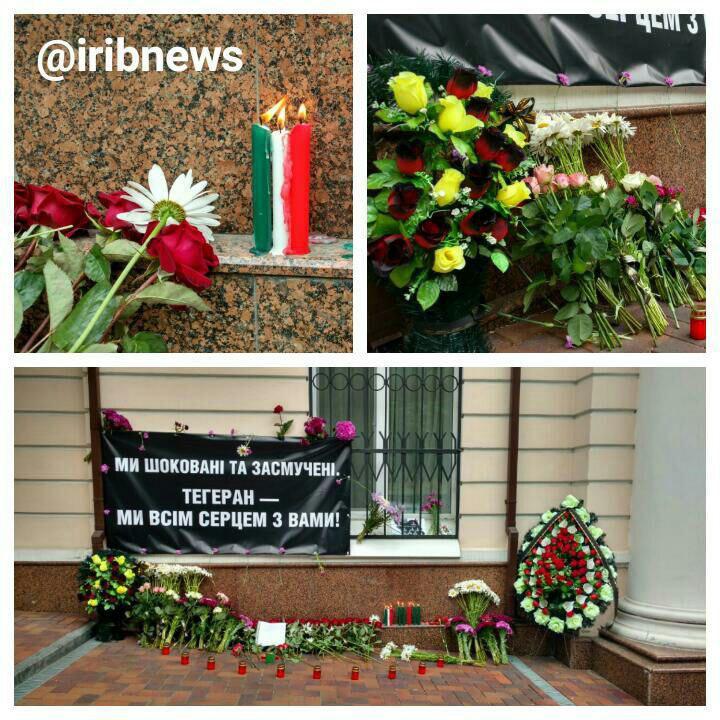 اهدا گل و گرامیداشت شهدای حمله تروریستی تهران در کی یف (عکس)