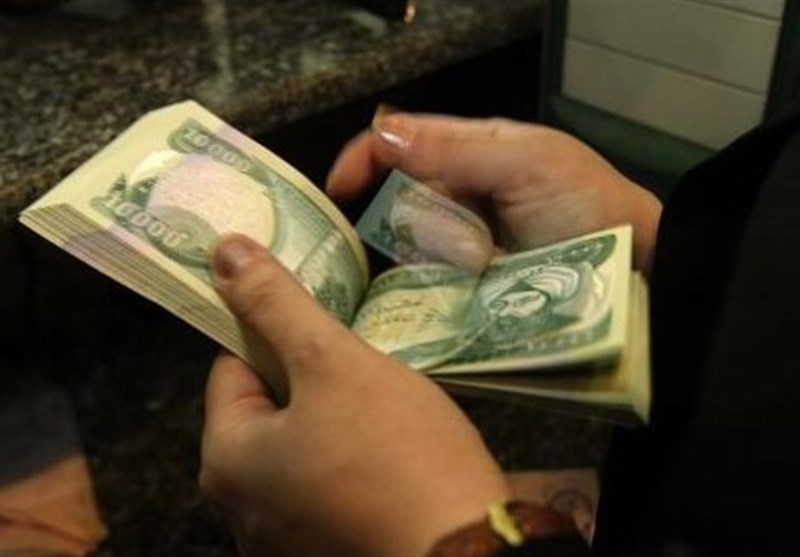 عراق برای جبران کسری بودجه ارزش دینار را 23 درصد کاهش داد